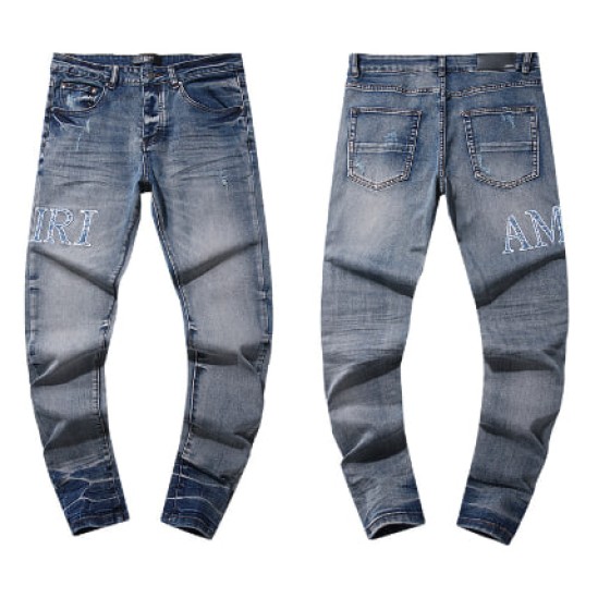 Light Blue Washed Denim Jeans with Blue Crystal AMIRI Logo